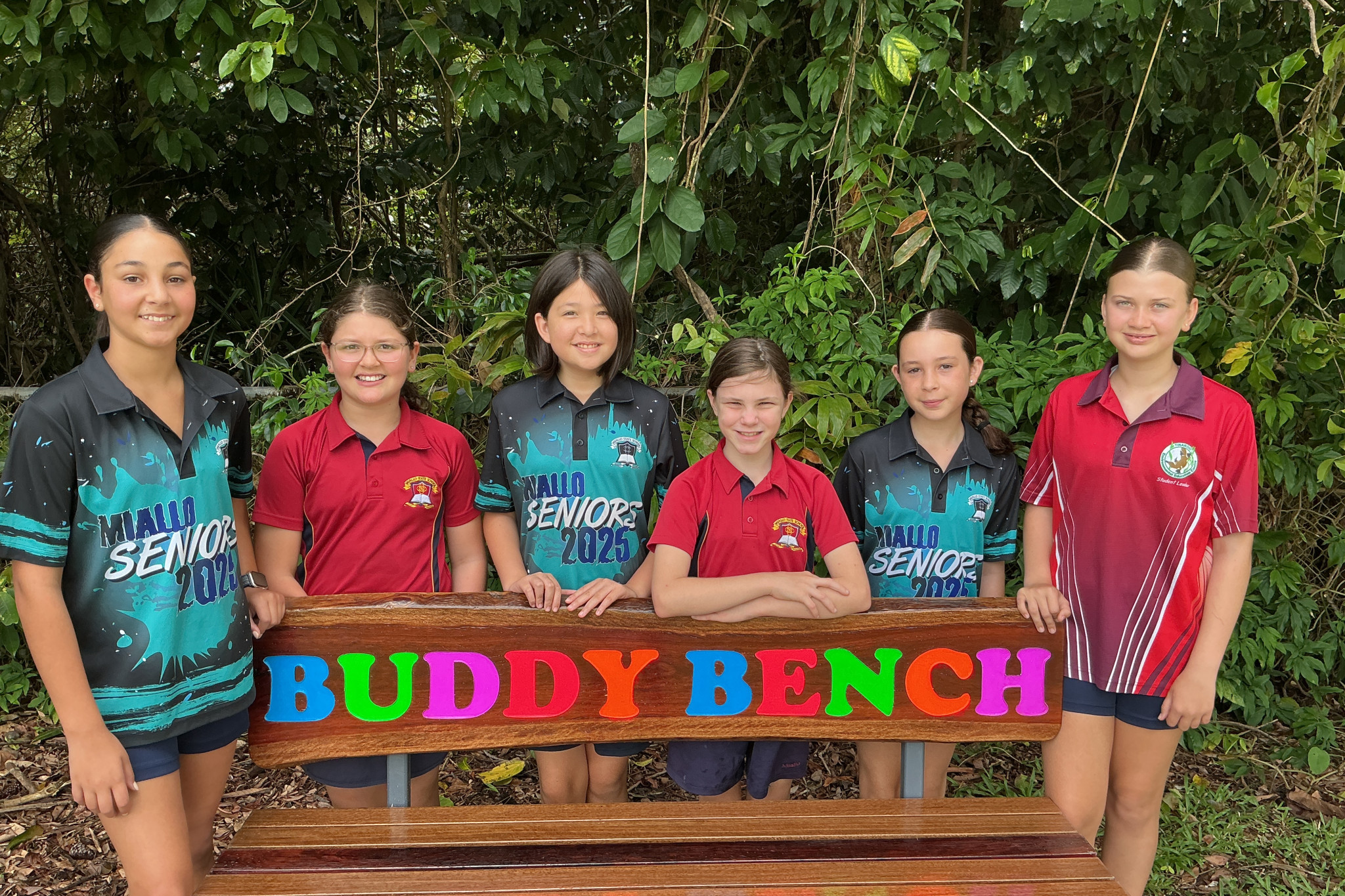 Miallo State School student councillors (from left) Stella, Sienna, Lilico, Ava, Samara and Isla (surnames withheld) with the buddy bench. Picture: Supplied