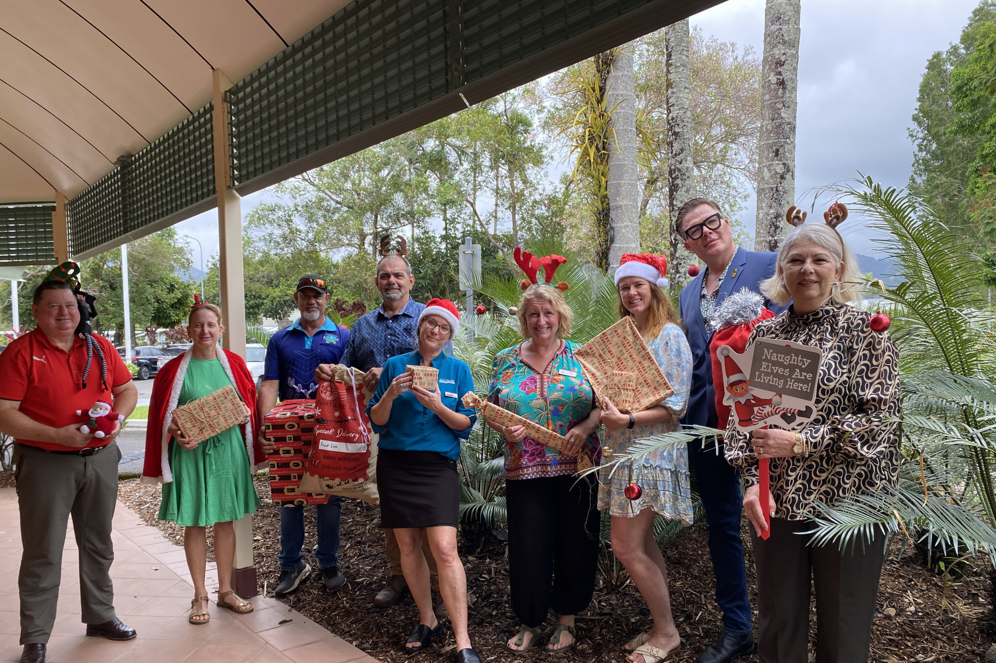 From left, Councillor Damian Meadows , Councillor Abigail Noli, Lee Yeatman (Goobidi Bamaga), Councillor Roy Zammataro, Anita Everett (DSC), Emma Travers (Port Douglas Neighbourhood Centre), Erica Mast (Mossman Support Services), Councillor Michael Rees and Mayor Lisa Scomazzon get into the festive spirit as part of the Mayor’s Christmas Appeal.