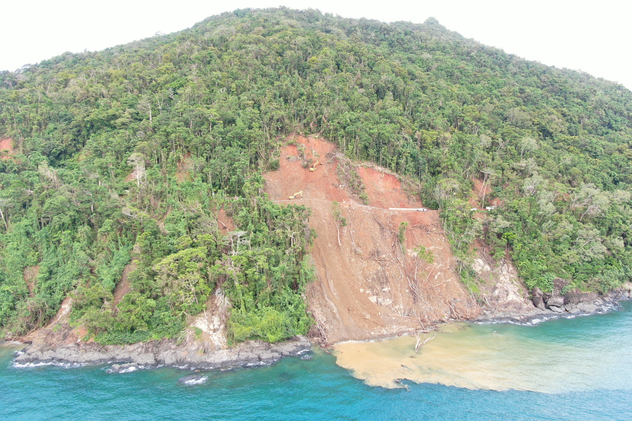 Flooding damage around the region, like the landslides at Noah Range above, put “a kink” in the budget for Douglas Shire Council.