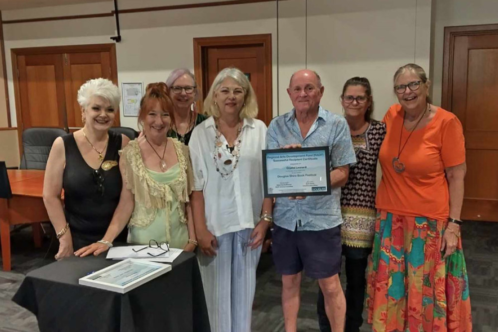 The Douglas Shire Book Festival committee at the RADF grant recipient ceremony last month. Accepting the certificate (from left) Sam Woodgarth, Chantal Munro, Jancy-Leigh Marrinon, Douglas Shire Mayor Lisa Scomazzon, Rob Hubbard, Robyn Ross and Georgie Montague. Absent: Crystal Leonardi. Picture: Supplied