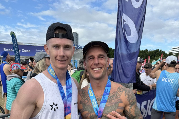 Alex Forbes (left) and Liam Brandt celebrate their success in the Gold Coast Marathon. Picture: Supplied