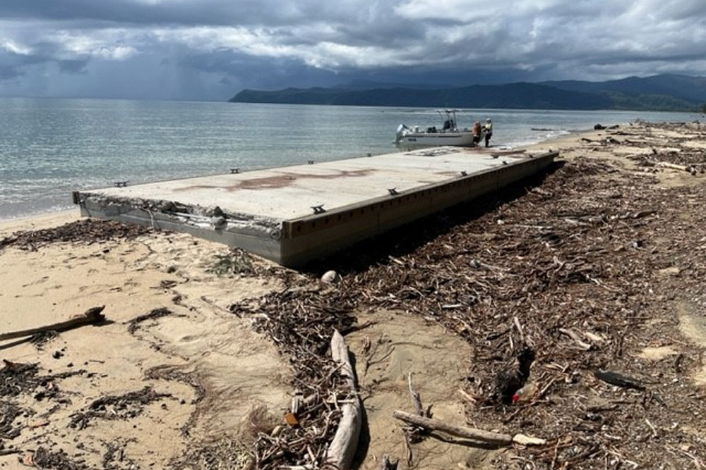 The Bloomfield River pontoon was swept out to sea after Cyclone Jasper and found 4km away on a beach. Picture: DTMR