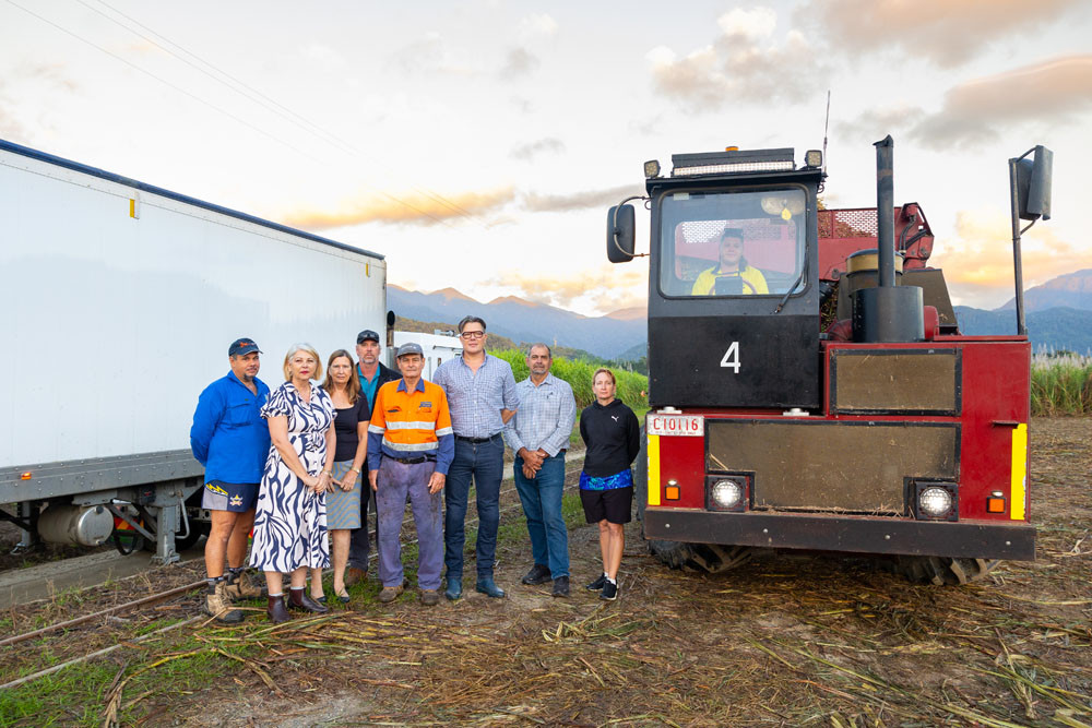 The start of the 2024 harvest with cane grower Gerard Puglisi (left), Douglas Shire Council Mayor Lisa Scomazzon, cane growers Carmel Raldini, Matthew Watson, Joe Raldini, Cr Michael Rees, Deputy Mayor Cr Roy Zammataro and Cr Abigail Noli and bin hauler Nathan Wynne. Picture: Supplied