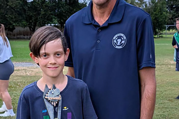 Singles champion Flynn Wisniewski with president Robert Borzi.