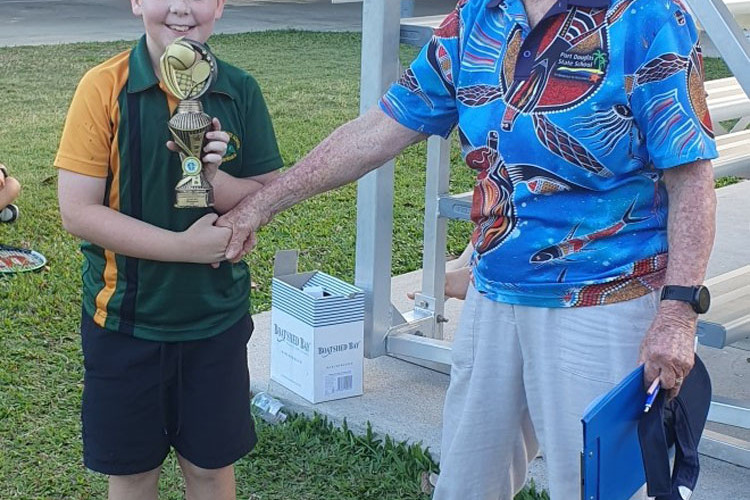 Tennis singles champion Nate Bender with Bev Gwynne.