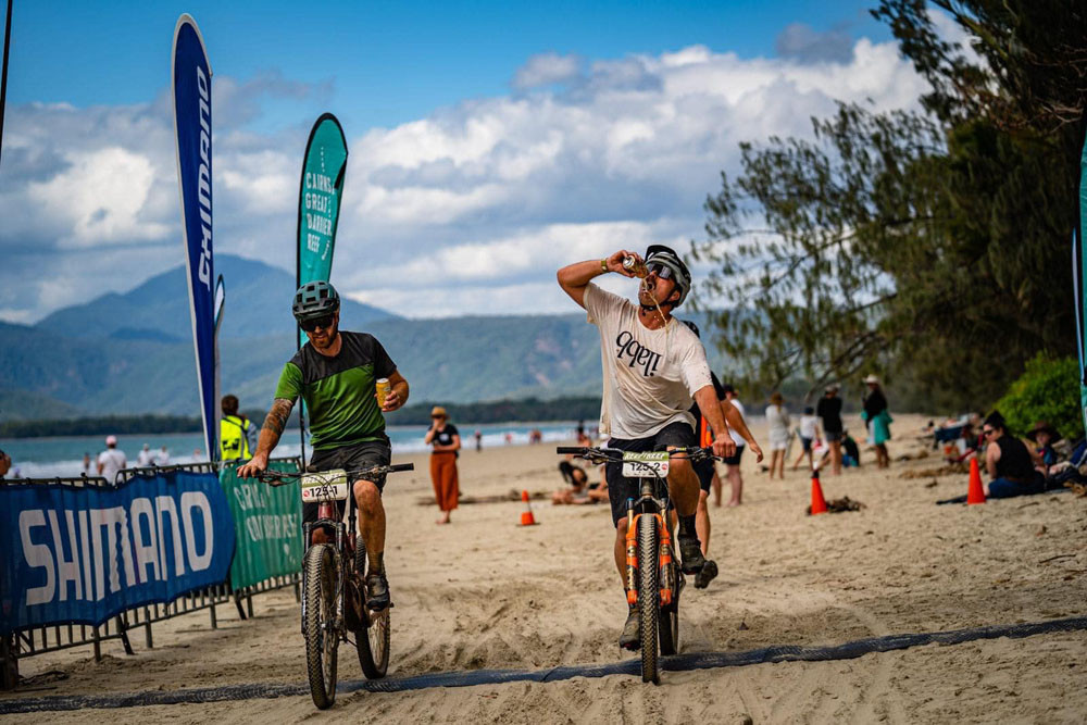 Reef to Reef competitors at the Four Mile Beach finishing line. Picture: Supplied