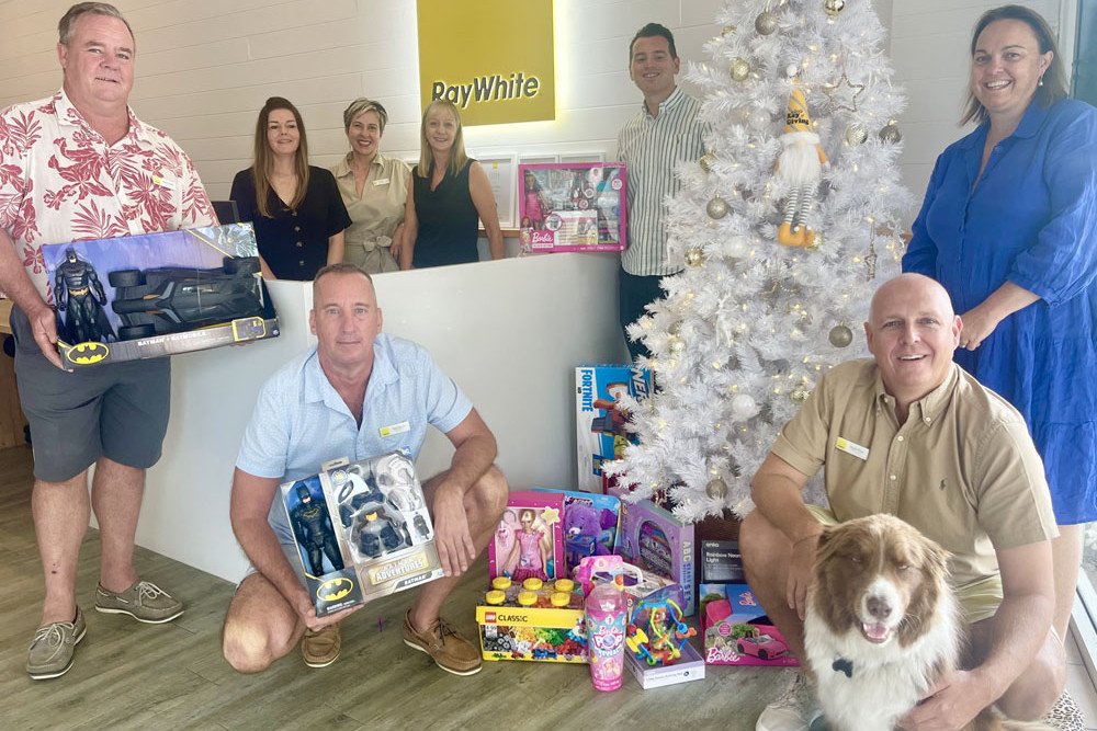 The Ray White Port Douglas team (from left) Steve Doble, Dawn Hemsley, Soula Kazakis, Julie Brentson, Lee Tartaglia, Cassie Flinn, Mark Flinn, Duke and Tony Soltys. Picture: Ray White Port Douglas