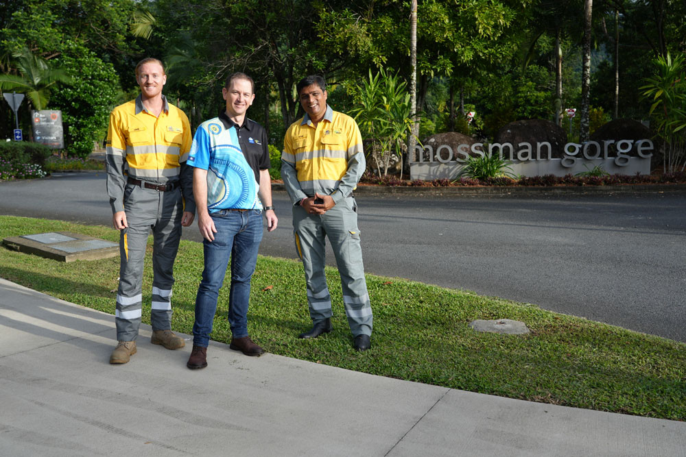 Microgrid projects engineer Jake Anderson (left), renewables and distributed energy general manager Glenn Springall and project manager Nitin Ghandi at the launch of the microgrid at the Mossman Gorge. Pictures: Ergon Energy