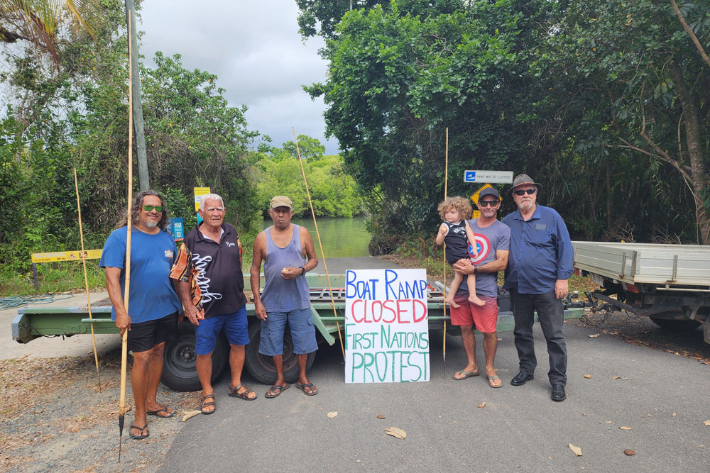 Linc Walker (left), Danny O’Shane, Bennett Walker, Rob Williams with son Bennett Williams and John Walker protesting at the Cooya Beach boat ramp. Picture: Supplied