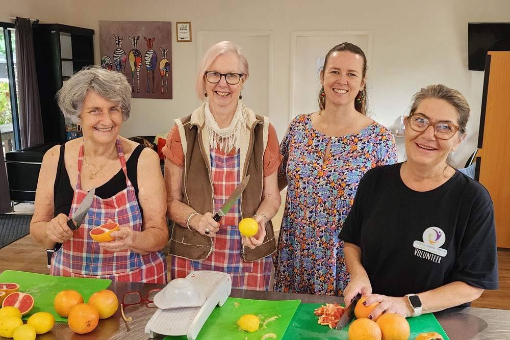 Margherita Tardio (left), Jancy-Leigh Marrinon, Erica Mast and Shirley John try their hand at fruit preserving at Mossman Support Services. Picture: Gary ‘Gazza’ McIlroy
