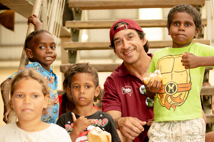 Rugby league legend and Get Ready Queensland ambassador Johnathan Thurston (JT) with some youngsters at Wujal Wujal where he urged the community to prepare now for the cyclone season. Picture: Steve Cooke Photography