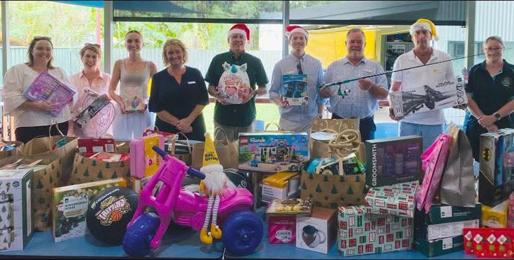 Cassie Flinn, Soula Kazakis, Lily Goldfinch, Emma Travers, Mark Flinn, Lee Tartaglia, Steve Doble, Tony Soltys, Coleen Forester with just some of the hampers that were delivered to those in need.