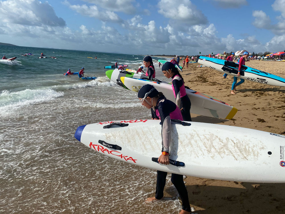 The trio about to hit the waves in Mackay. Pictures: Port Douglas Surf Lifesaving
